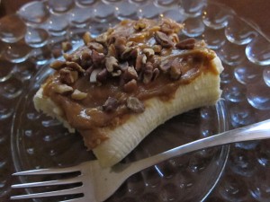 Nanner with maple almond butter and pecans