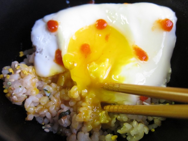Runny egg over rice