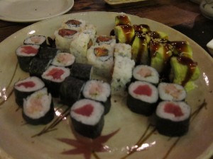 Maki of tuna, spicy tuna, yellowtail, and dragon roll with avocado