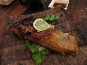 Miso-glazed salmon cheek off the grill