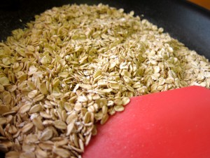 Stirring toasting oats