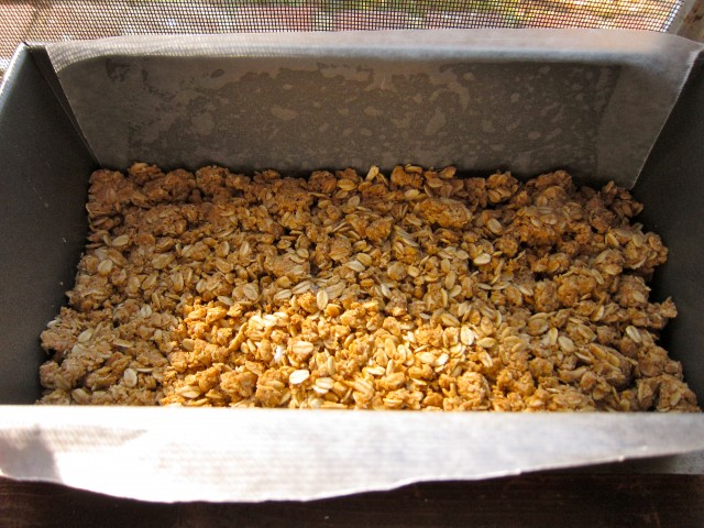 Crumbled oats in loaf pan