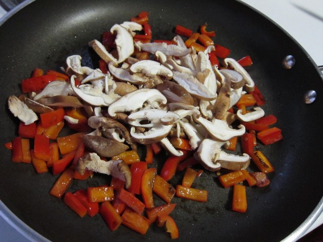 Sautee red pepper and shiitakes