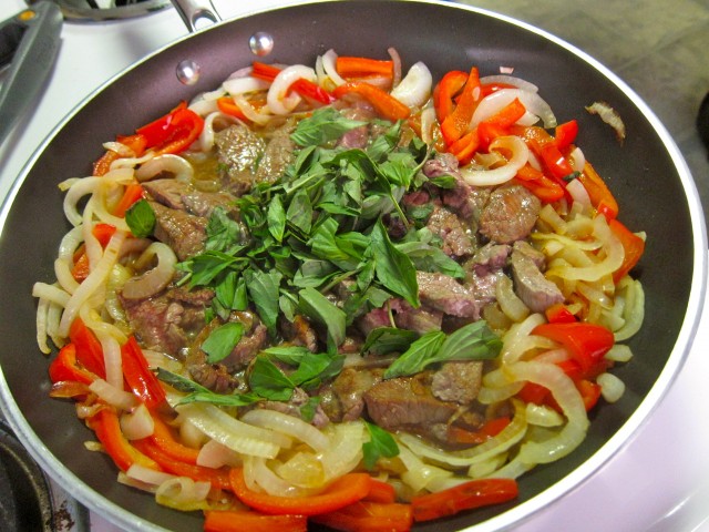 Thai basil beef simmering