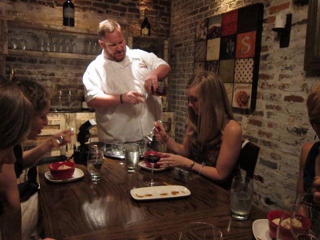 Ron pouring out the bourbon