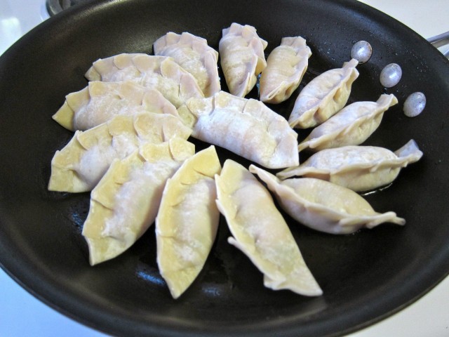 Place potstickers in hot pan