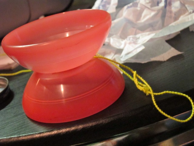 red plastic yo-yo