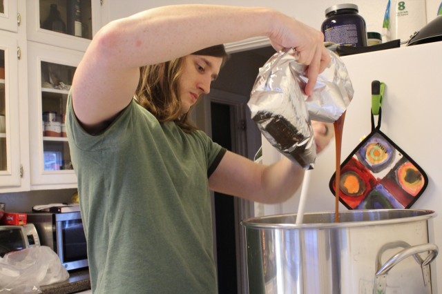 Stirring in the malt extract