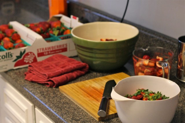 cutting strawberries for jam